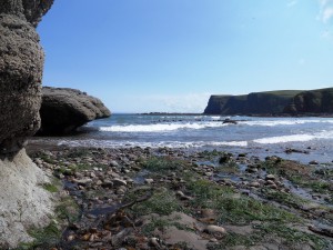 Standing at the mouth of a cave